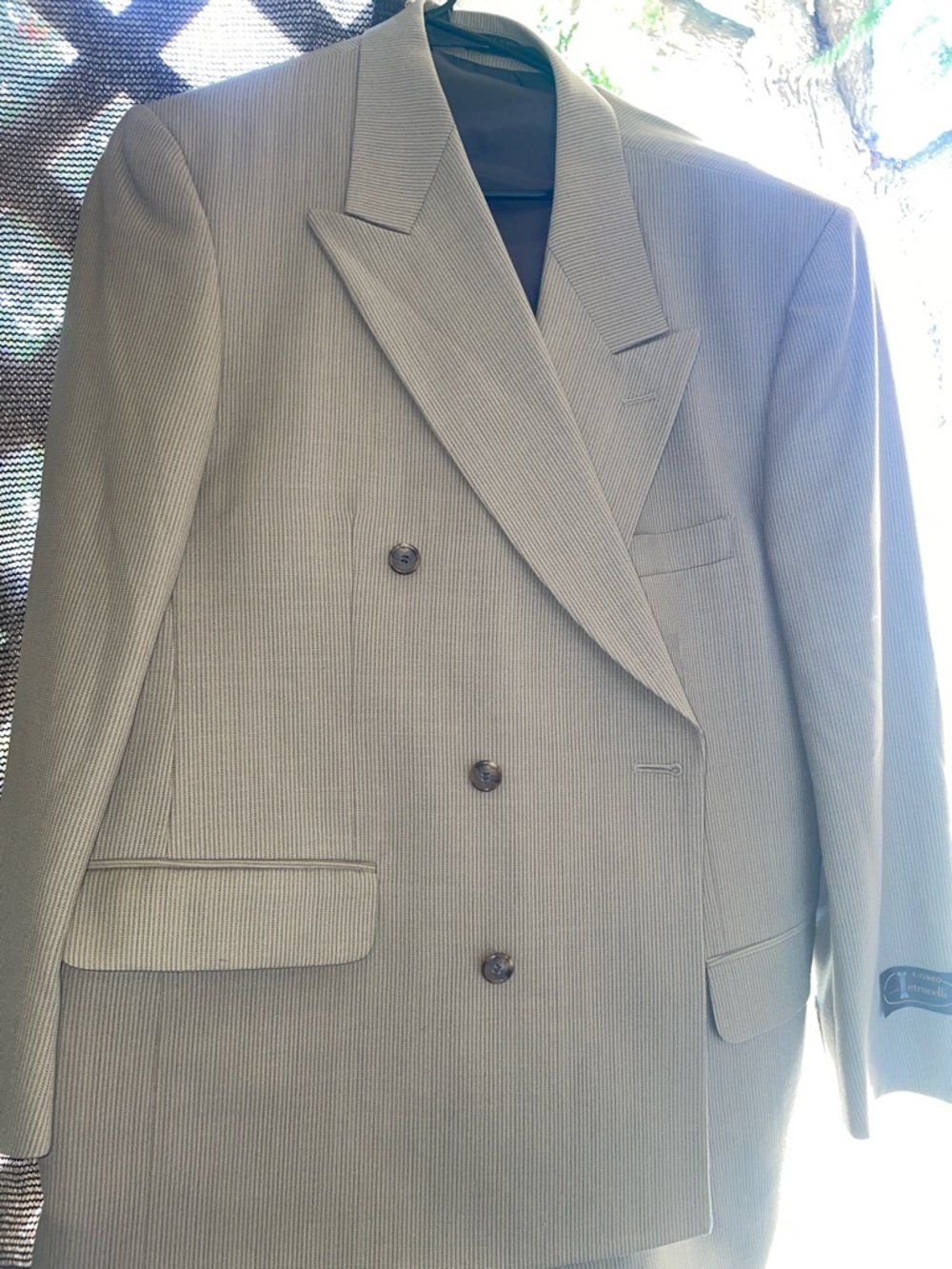 Double-Breasted Men's Blazer in Light beige with slacks, suit.